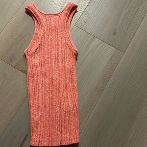 This flattering Anthropologie tank in summer melon